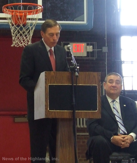 Photo by Ken Cashman  Gen. David H. Petraeus addresses a large audience at the Newburgh Armory Unity Center on Oct. 31.
