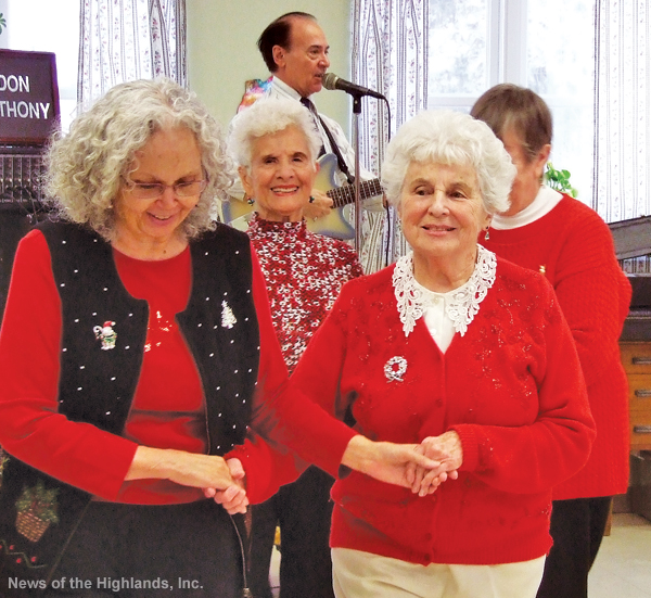 Photo by Jason Kaplan The annual senior citizen Christmas party was held on Dec. 20 at Munger Cottage. Don Anthony entertained guests with music as they danced the Hokey Pokey and even the Macarena. And what Christmas party would be complete without dancing the Horah?