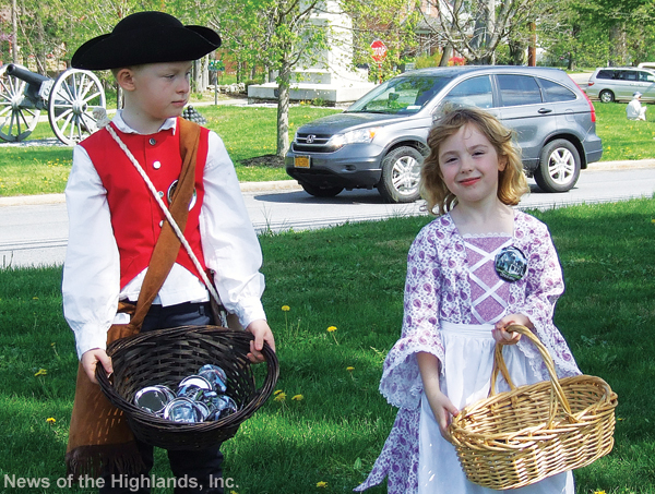On the day of the plant sale, the McDonald kids wore period costumes and sold buttons to raise money for the Sands Ring Homestead renovation.  