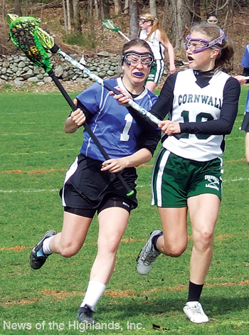 Photo by Ken Cashman Maddie McGuire (right) guards a Valley Central attacker in a Saturday morning game at Mount Airy.