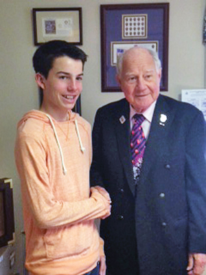 Aidan Burns (left) visited Sen. Bill Larkin on May 9 to thank him for his help in getting updated cochlear implants.