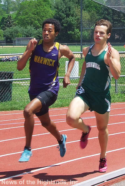 Photo by Ken Cashman Alex Combs (right) and Jordan Burton of Warwick ran side by side in the final half lap of the 800-meter run in the OCIAA championships. A few days later the battle continued at the Section IX meet in Middletown.