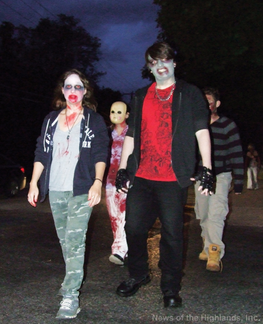 By Jason Kaplan Zombies took over Main Street on the evening of Oct. 18, as about 80 individuals dressed as the undead to help raise money for the Hudson Valley SPCA. They walked from Brid’s Closet to Town Hall and then back to the Main Street shop where they enjoyed a potluck dinner. The group raised $300 for the animal shelter. 