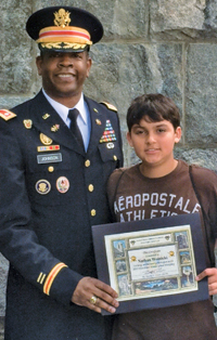 Contributed photo Nathan Woinicki received a certificate from Lt. Col. Tony Johnson at the end of a four-day program at West Point.