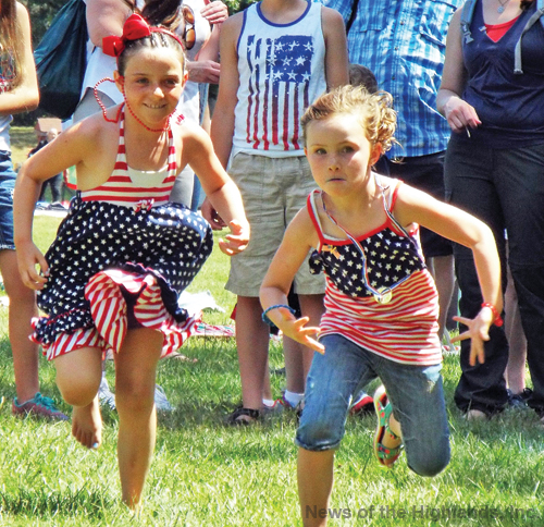 Photo by Jason Kaplan Children, in their Fourth of July best, showed off the red, white, and blue as they participated in the late morning races during the Independence Day celebration on Monday.