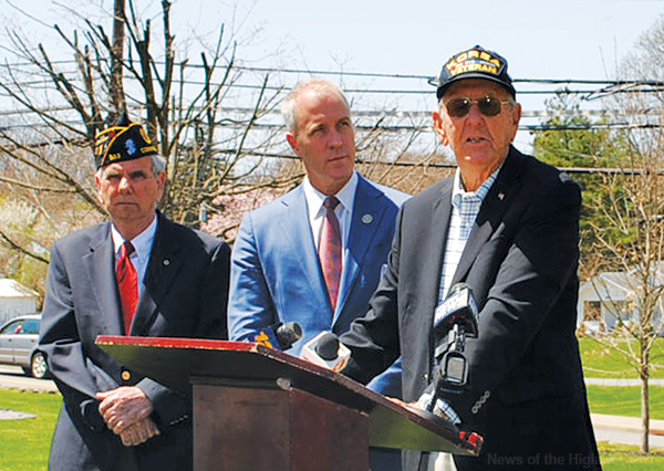 Photo by Lauree Mackay Supervisor Richard Randazzo and Congressman Sean Patrick Maloney look on as Ray Mellin speaks Tuesday afternoon. Maloney visited Cornwall to announce new legislation that would eliminate the three-month limit on combat pay eligibility for Korean War POWs.