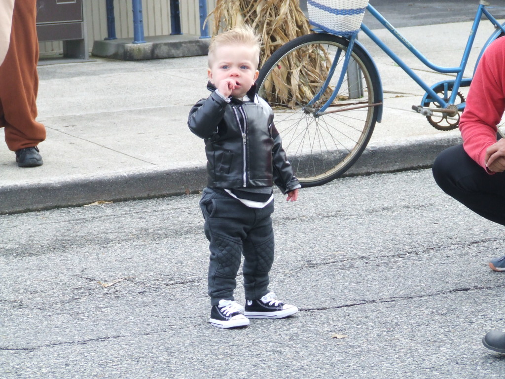 For a little guy, Aiden looks pretty tough. He's dressed like a T Bird from "Grease."